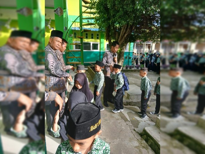 Memperkuat Adab dan Kasih Sayang Sesi Bersalaman Siswa dan Guru Setelah Apel Pagi di MIN 3 Kerinci